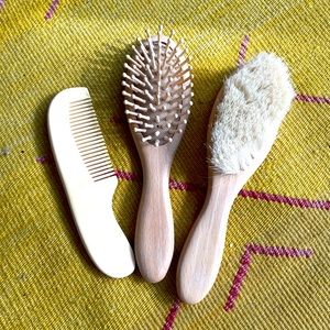 Gently used baby brushes and comb all natural wood